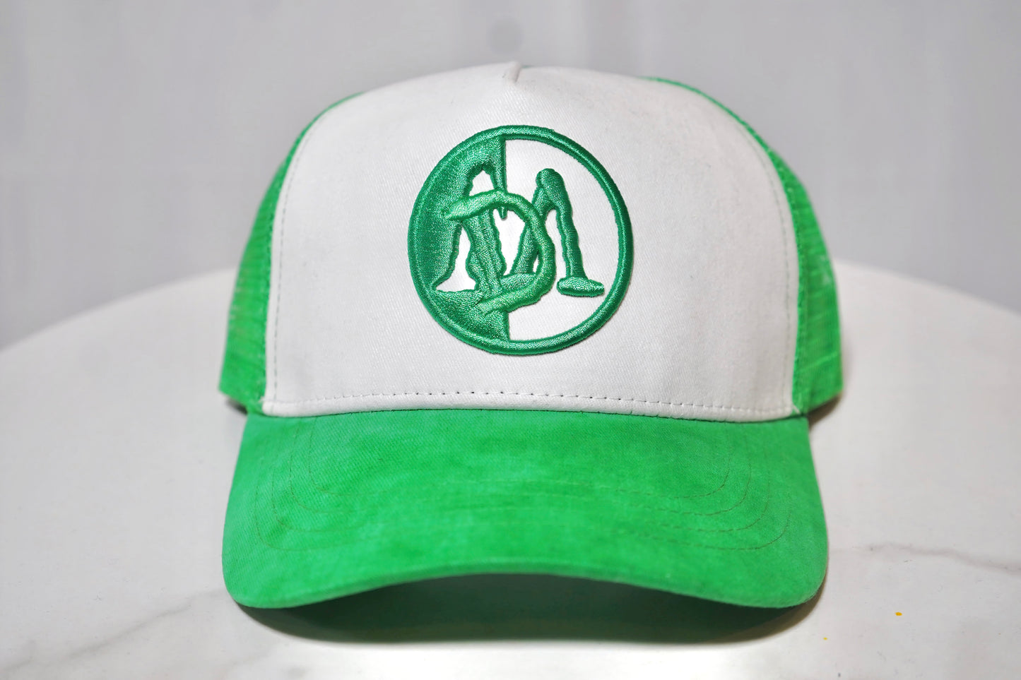 GREEN-DE-LA-NATURE Trucker Hat.